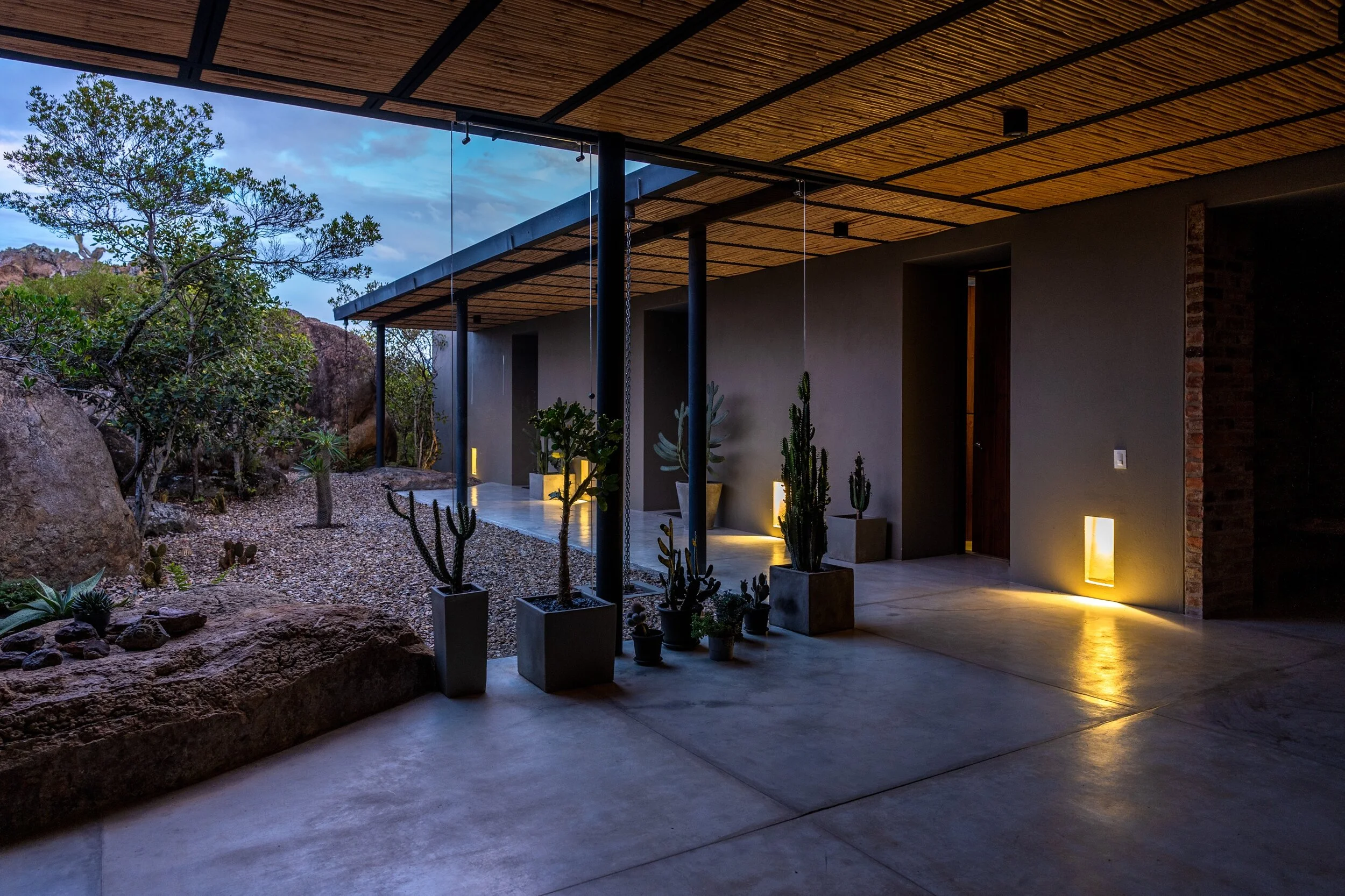 Residential architecture by LINEA PRIMA: contemporary home in wood, stone and natural light